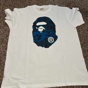 White T-Shirt with Blue Graphic